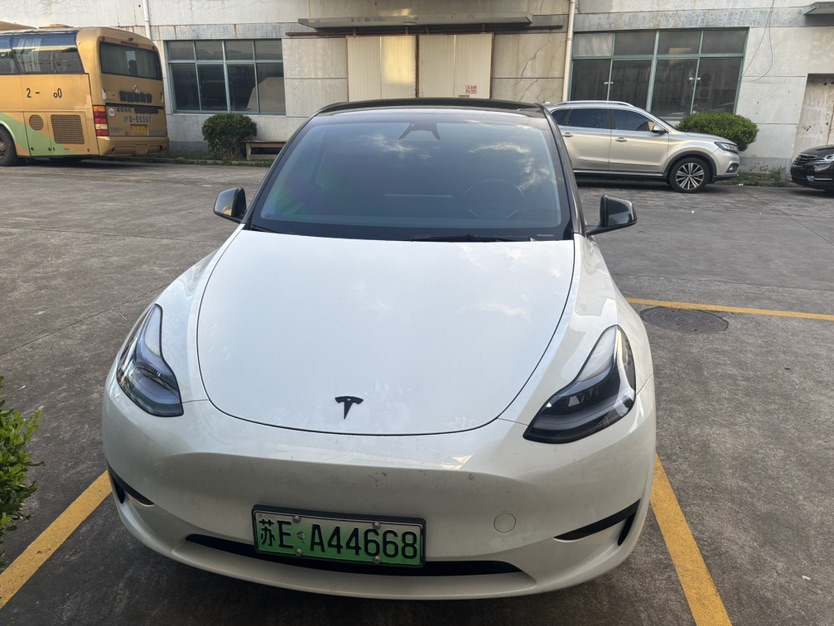 Tesla Model Y 2024 #2 Tesla Model Y 2024 car image #2