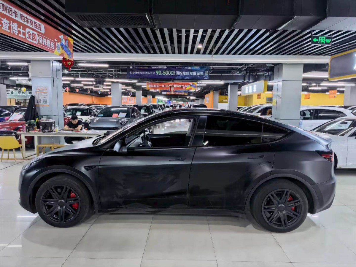 Tesla Model Y 2024 #3 Tesla Model Y 2024 car image #3