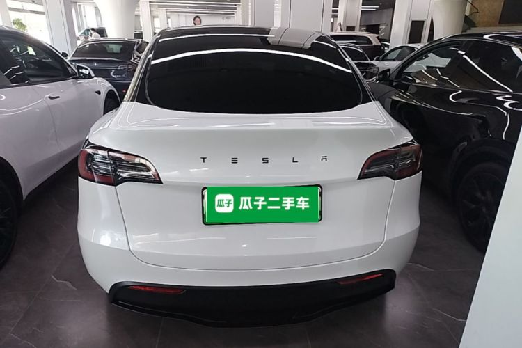 Tesla Model Y 2024 #6 Tesla Model Y 2024 car image #6