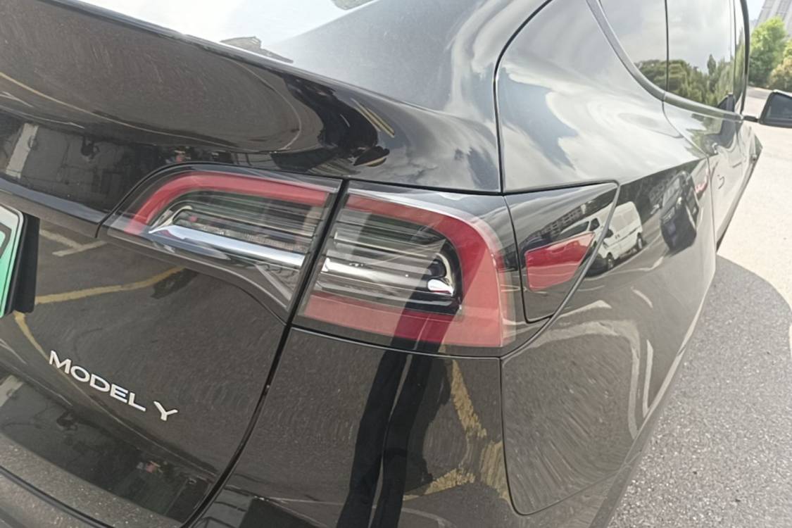 Tesla Model Y 2024 #7 Tesla Model Y 2024 car image #7