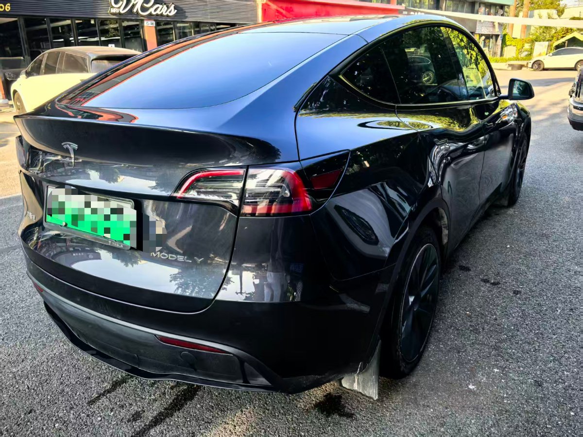 Tesla Model Y 2024 #4 Tesla Model Y 2024 car image #4