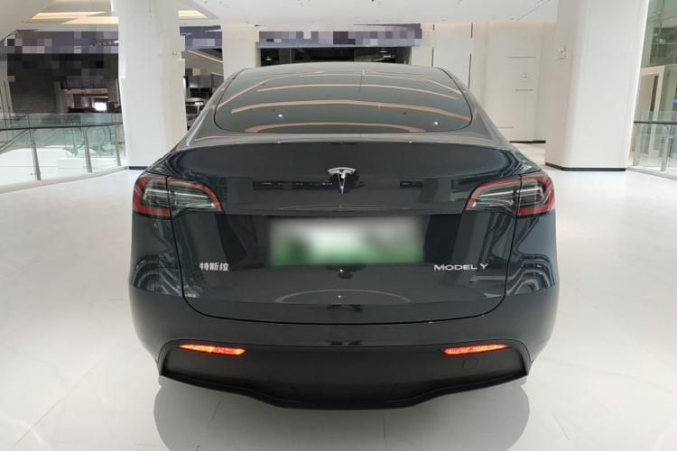 Tesla Model Y 2025 #6 Tesla Model Y 2025 car image #6