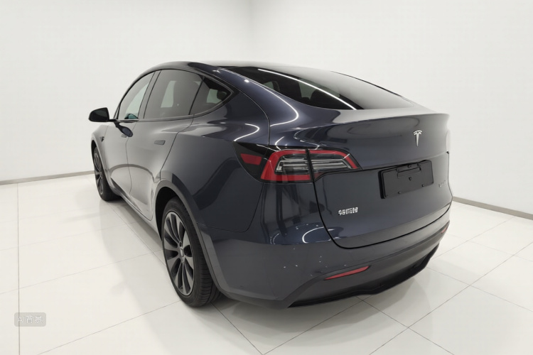 Tesla Model Y 2024 #5 Tesla Model Y 2024 car image #5