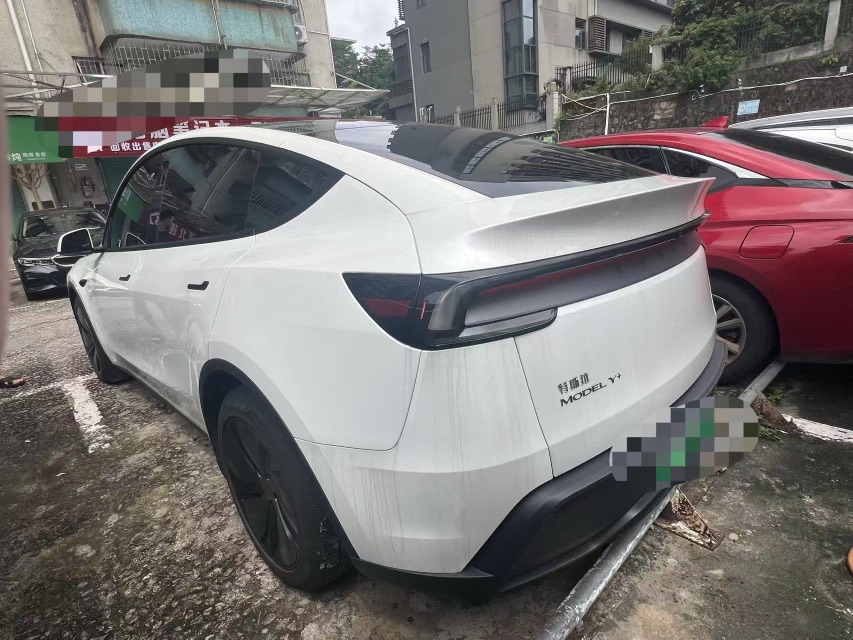 Tesla Model Y 2025 #6 Tesla Model Y 2025 car image #6