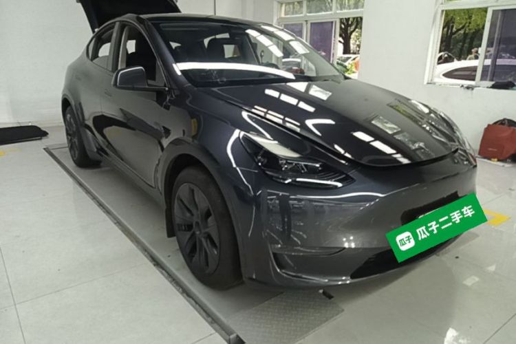 Tesla Model Y 2024 #6 Tesla Model Y 2024 car image #6