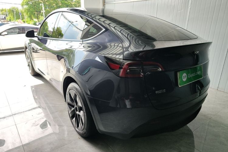 Tesla Model Y 2024 #5 Tesla Model Y 2024 car image #5