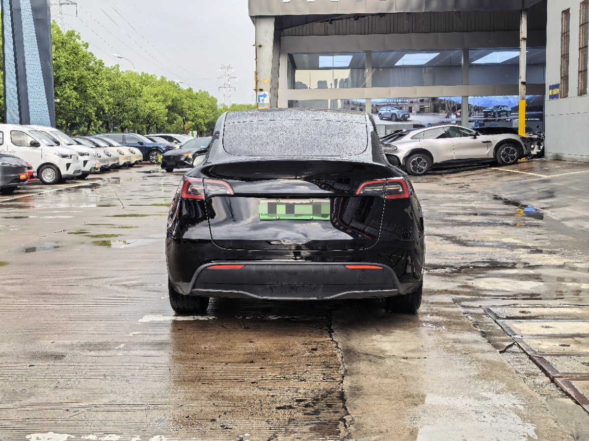 Tesla Model Y 2023 #4 Tesla Model Y 2023 car image #4