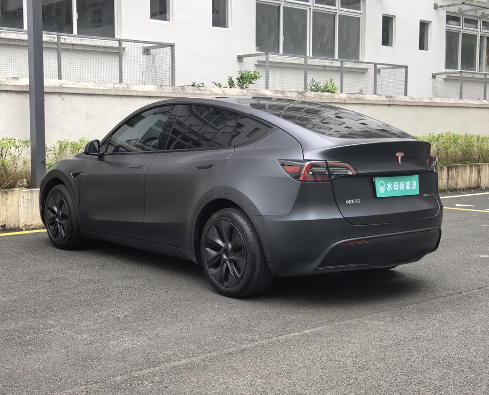 Tesla Model Y 2024 #4 Tesla Model Y 2024 car image #4