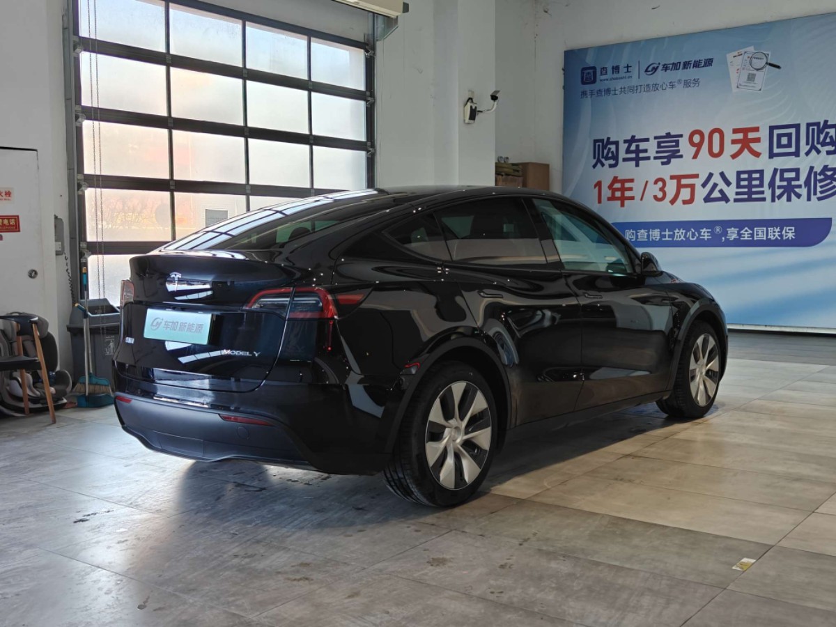 Tesla Model Y 2024 #6 Tesla Model Y 2024 car image #6