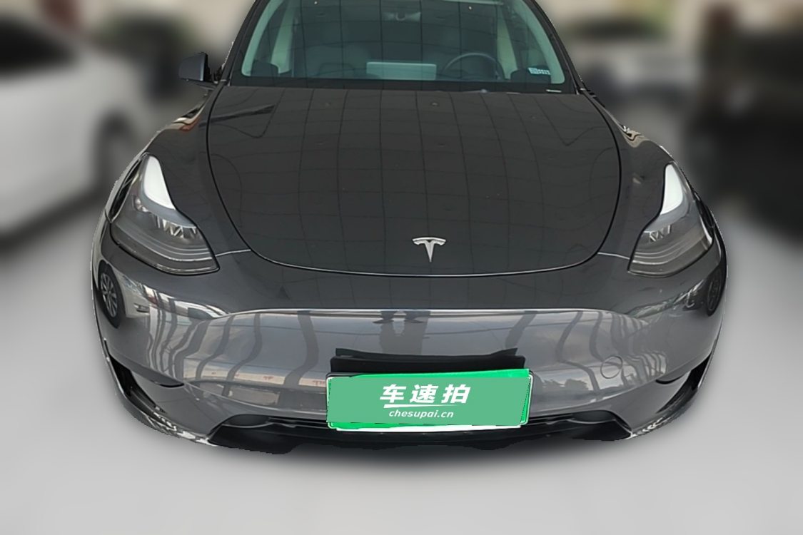 Tesla Model Y 2024 #5 Tesla Model Y 2024 car image #5