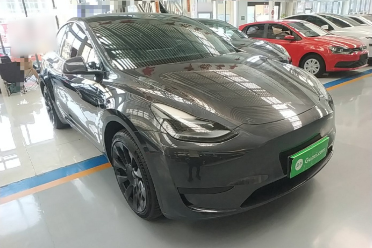 Tesla Model Y 2024 #6 Tesla Model Y 2024 car image #6