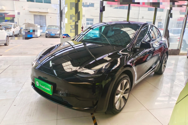 Tesla Model Y 2023 #2 Tesla Model Y 2023 car image #2