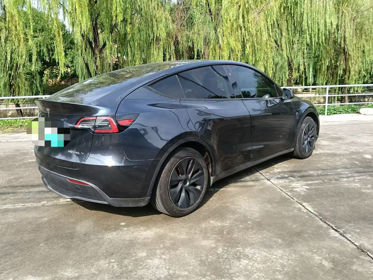 Tesla Model Y 2024 #4 Tesla Model Y 2024 car image #4