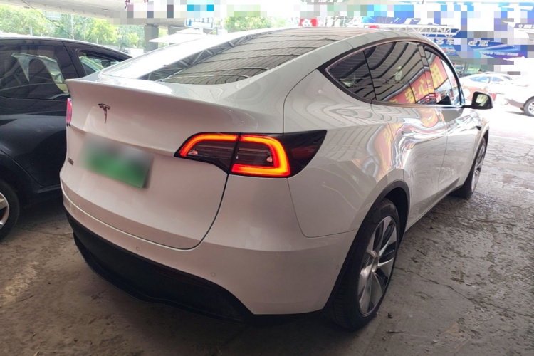 Tesla Model Y 2023 #7 Tesla Model Y 2023 car image #7