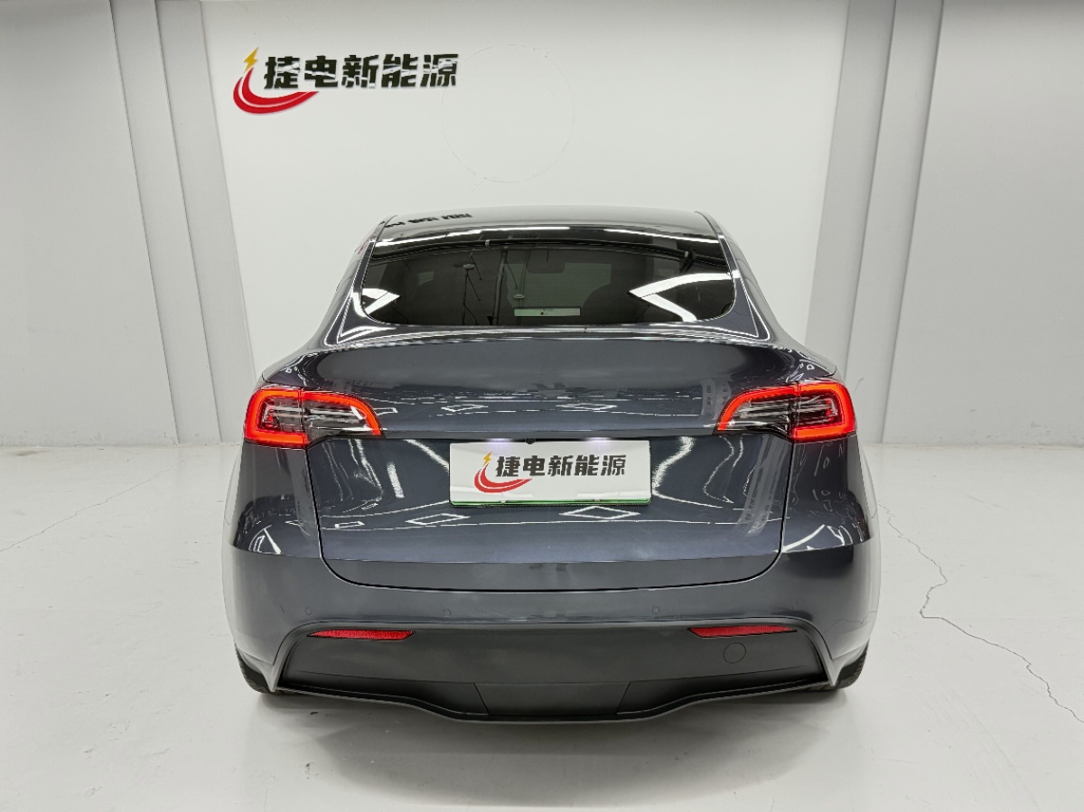 Tesla Model Y 2023 #4 Tesla Model Y 2023 car image #4