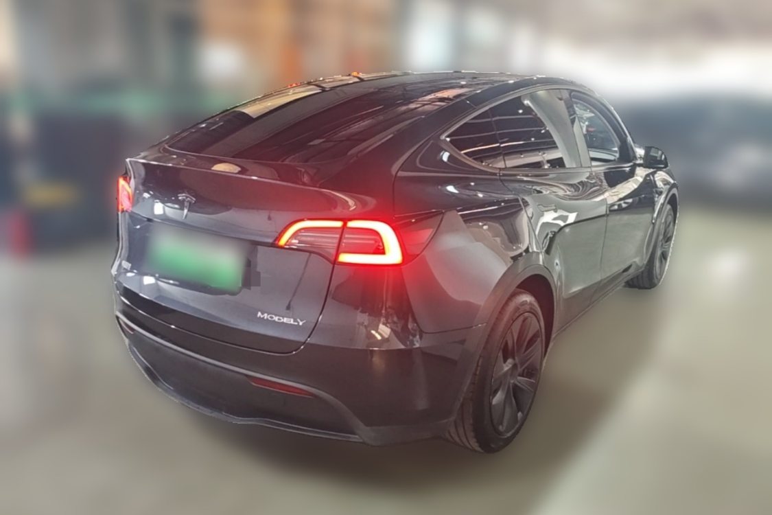 Tesla Model Y 2024 #4 Tesla Model Y 2024 car image #4