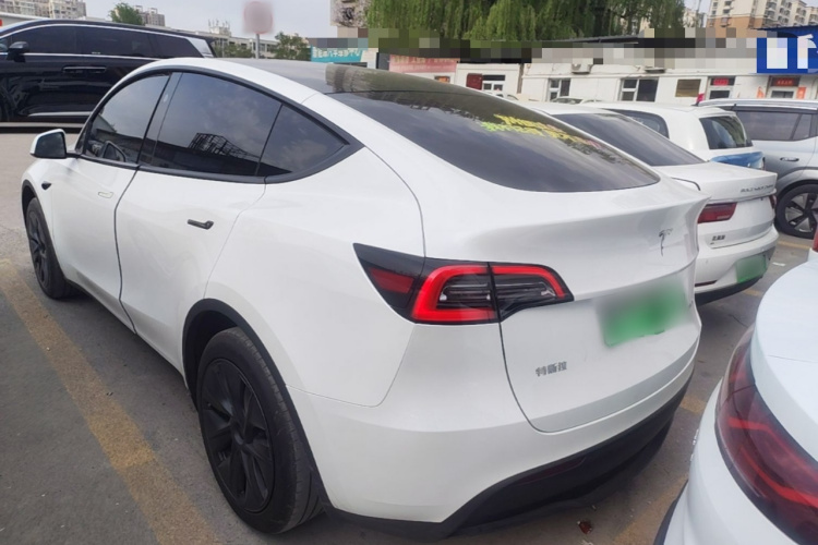 Tesla Model Y 2024 #5 Tesla Model Y 2024 car image #5