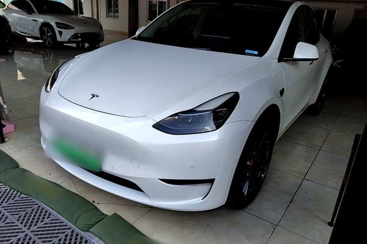 Tesla Model Y 2024 #2 Tesla Model Y 2024 car image #2