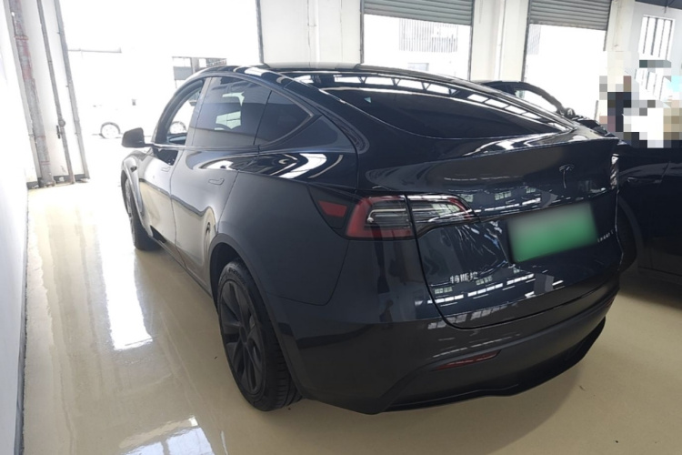 Tesla Model Y 2024 #5 Tesla Model Y 2024 car image #5