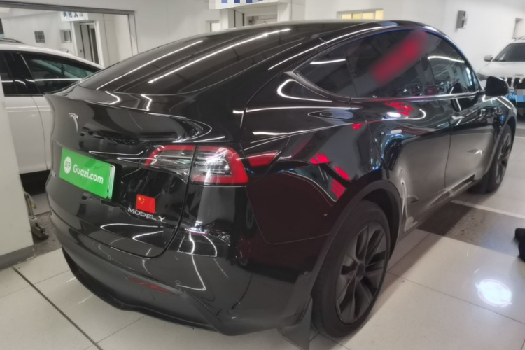 Tesla Model Y 2024 #7 Tesla Model Y 2024 car image #7