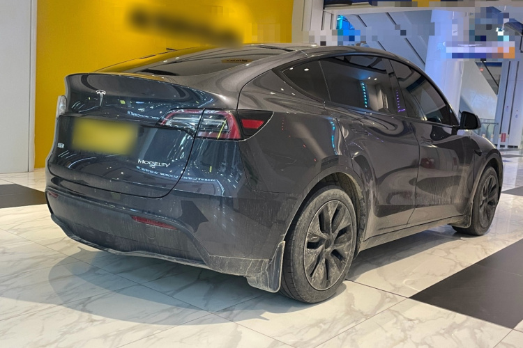 Tesla Model Y 2024 #7 Tesla Model Y 2024 car image #7