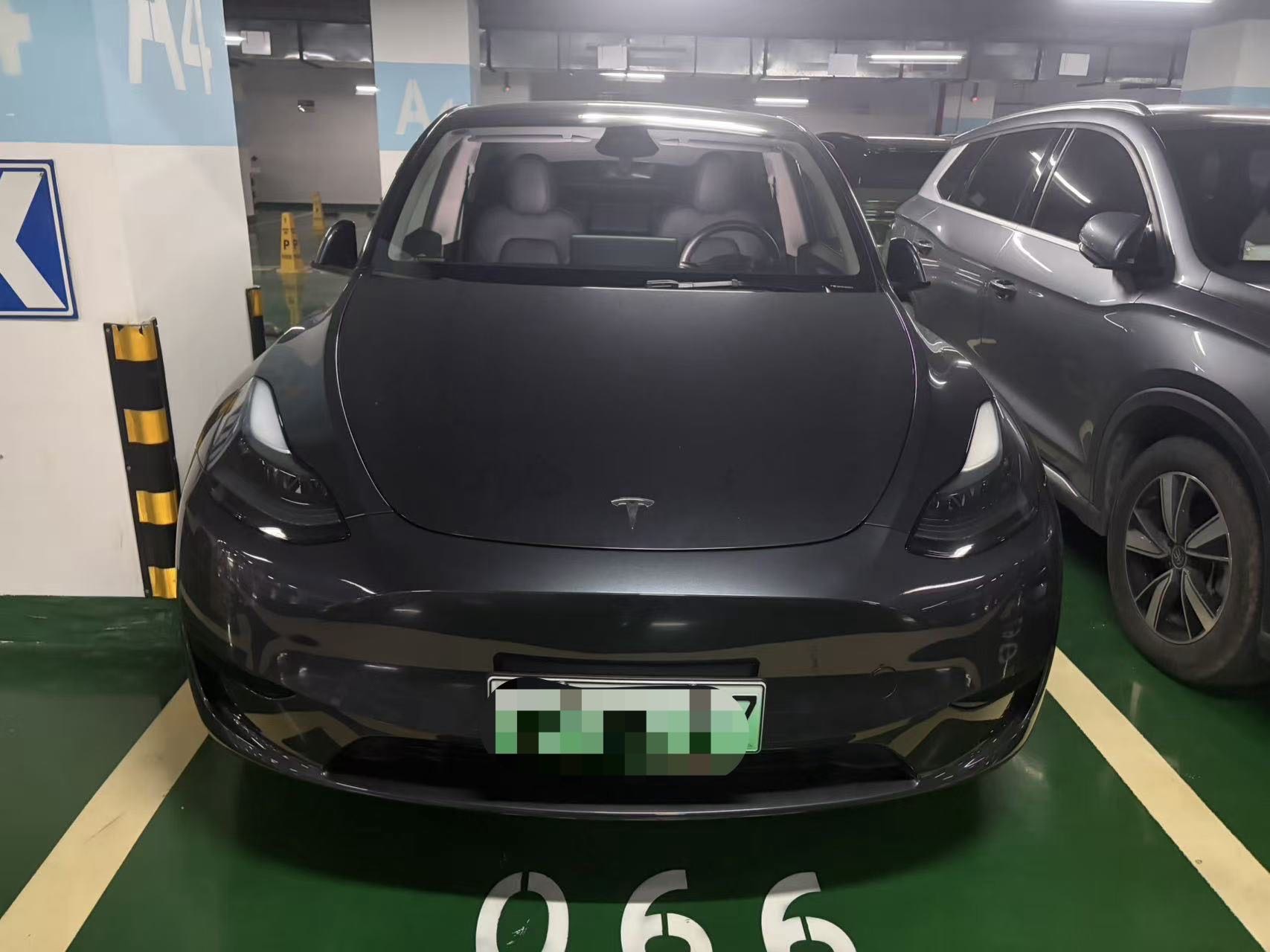 Tesla Model Y 2024 #4 Tesla Model Y 2024 car image #4