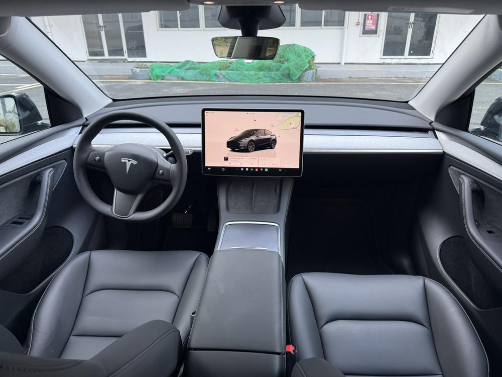 Tesla Model Y 2024 #9 Tesla Model Y 2024 car image #9