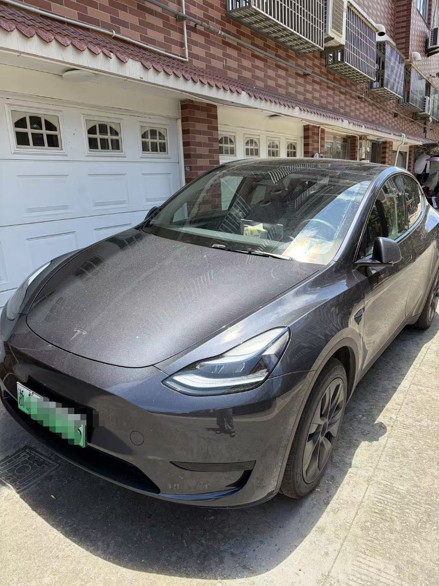 Tesla Model Y 2024 #2 Tesla Model Y 2024 car image #2