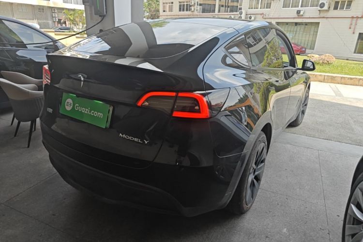 Tesla Model Y 2024 #7 Tesla Model Y 2024 car image #7