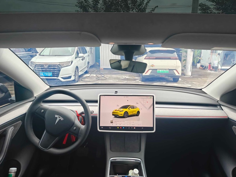 Tesla Model Y 2024 #7 Tesla Model Y 2024 car image #7