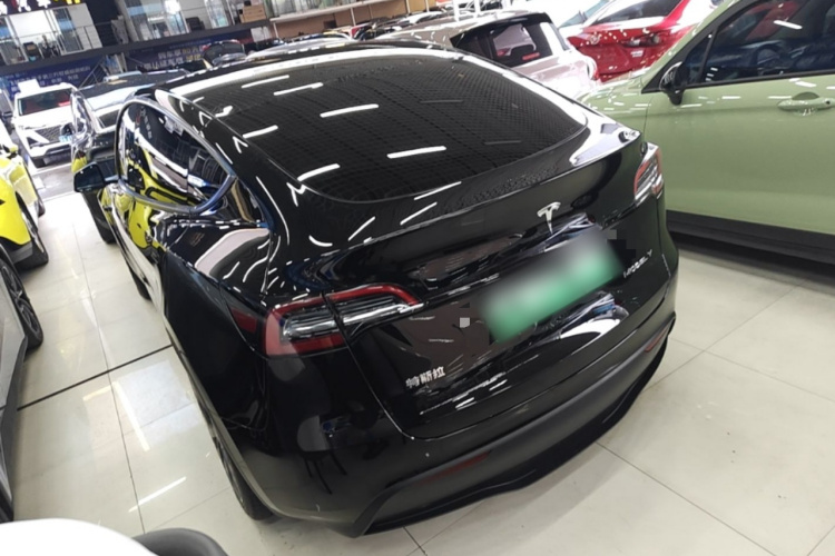Tesla Model Y 2024 #5 Tesla Model Y 2024 car image #5