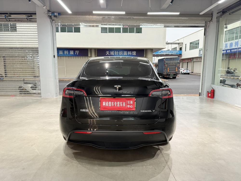 Tesla Model Y 2023 #5 Tesla Model Y 2023 car image #5