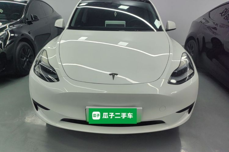 Tesla Model Y 2024 #3 Tesla Model Y 2024 car image #3