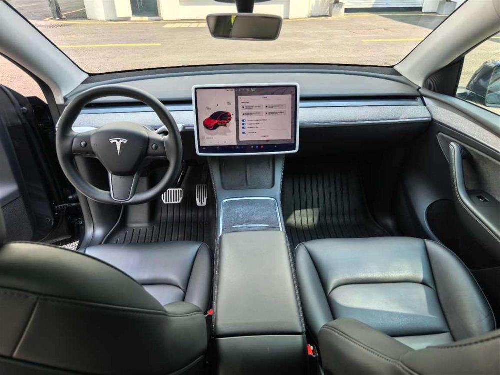 Tesla Model Y 2024 #9 Tesla Model Y 2024 car image #9
