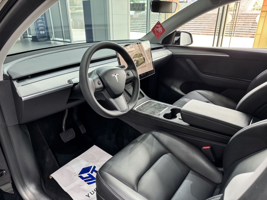 Tesla Model Y 2024 #7 Tesla Model Y 2024 car image #7