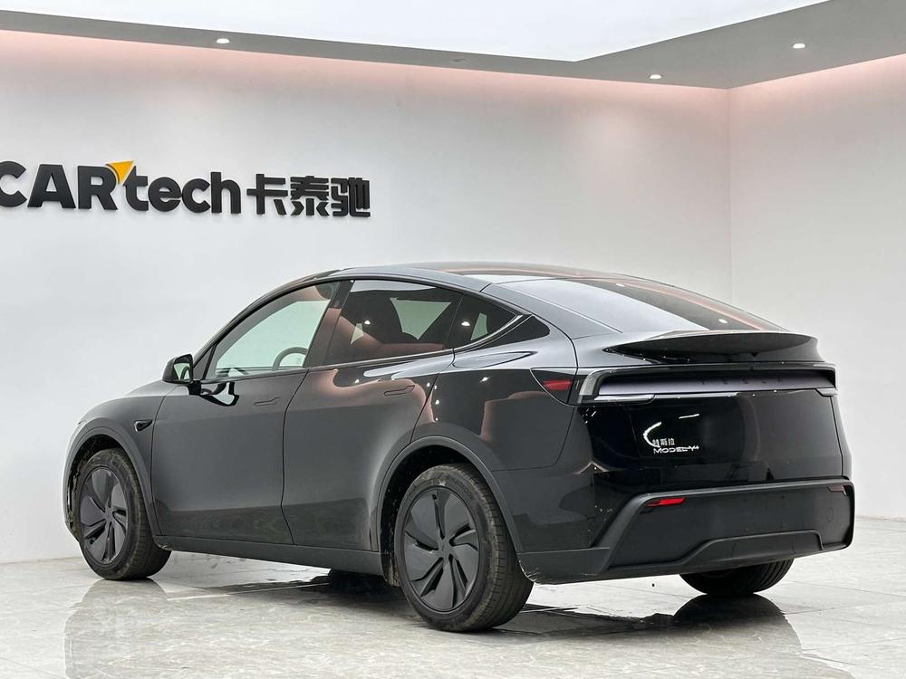 Tesla Model Y 2026 #5 Tesla Model Y 2026 изображение автомобиля #5