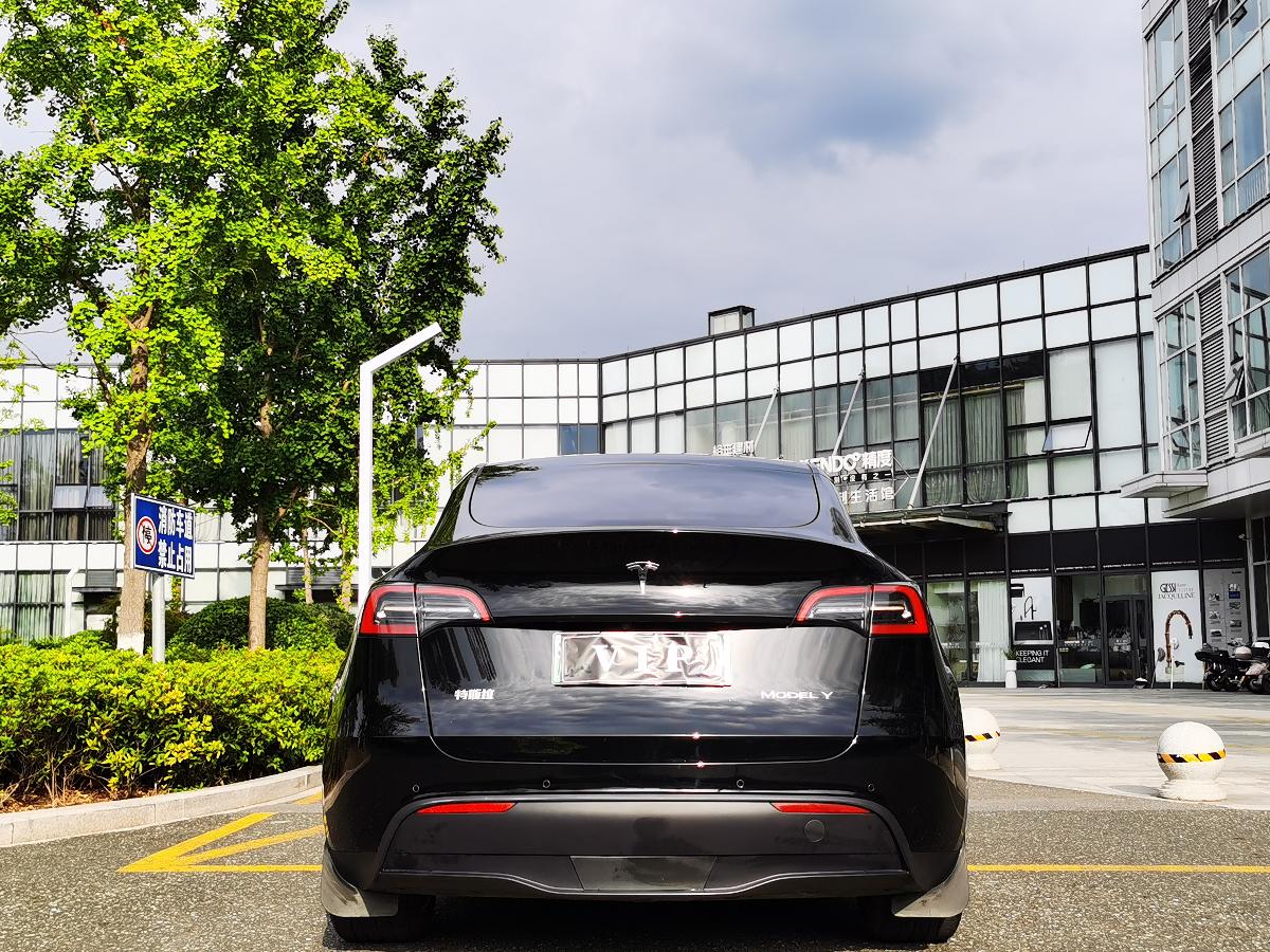 Tesla Model Y 2023 #5 Tesla Model Y 2023 car image #5