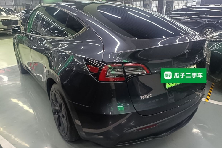 Tesla Model Y 2024 #5 Tesla Model Y 2024 car image #5