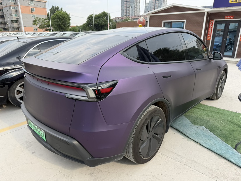Tesla Model Y 2025 #9 Tesla Model Y 2025 car image #9