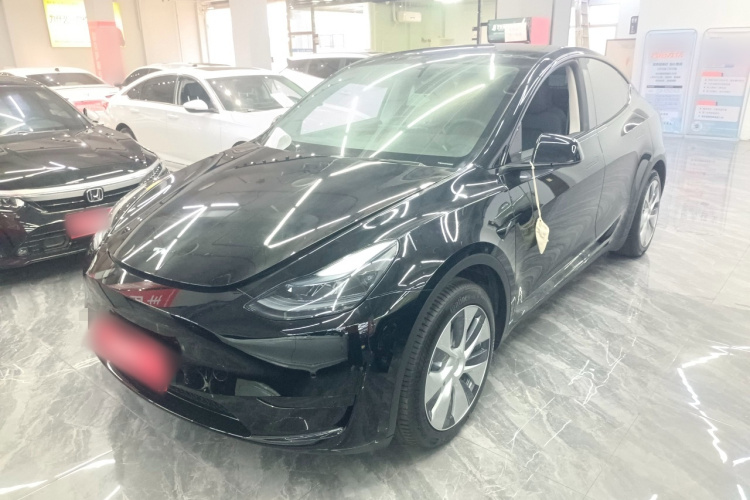 Tesla Model Y 2023 #2 Tesla Model Y 2023 car image #2