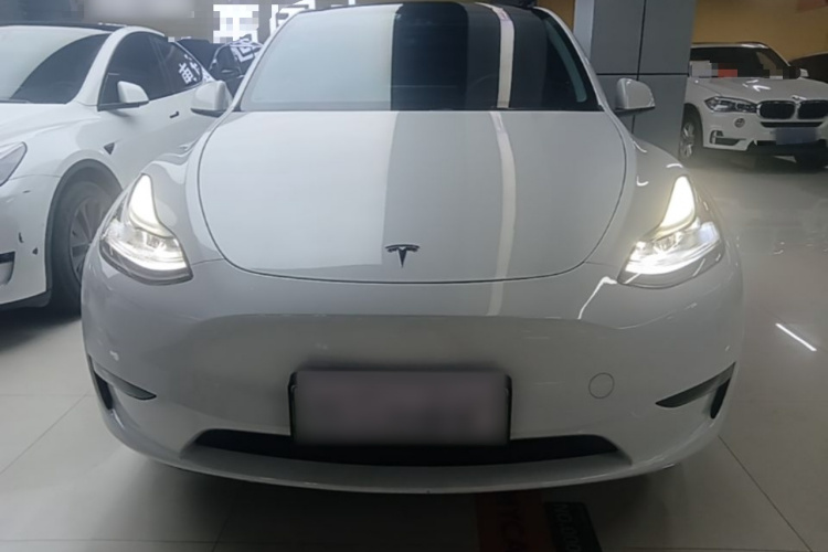Tesla Model Y 2024 #3 Tesla Model Y 2024 car image #3