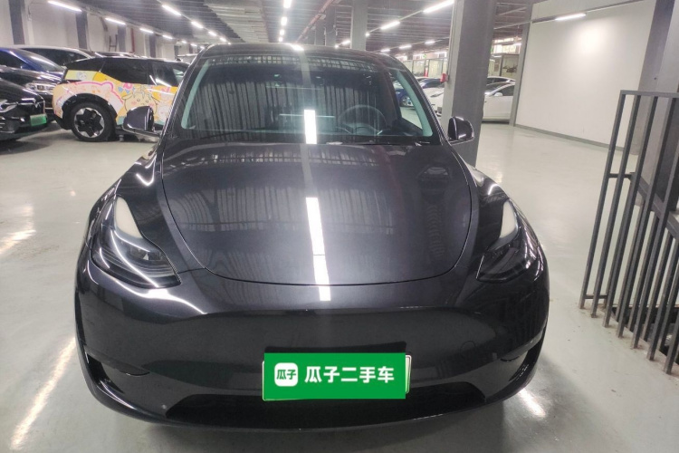 Tesla Model Y 2024 #3 Tesla Model Y 2024 car image #3