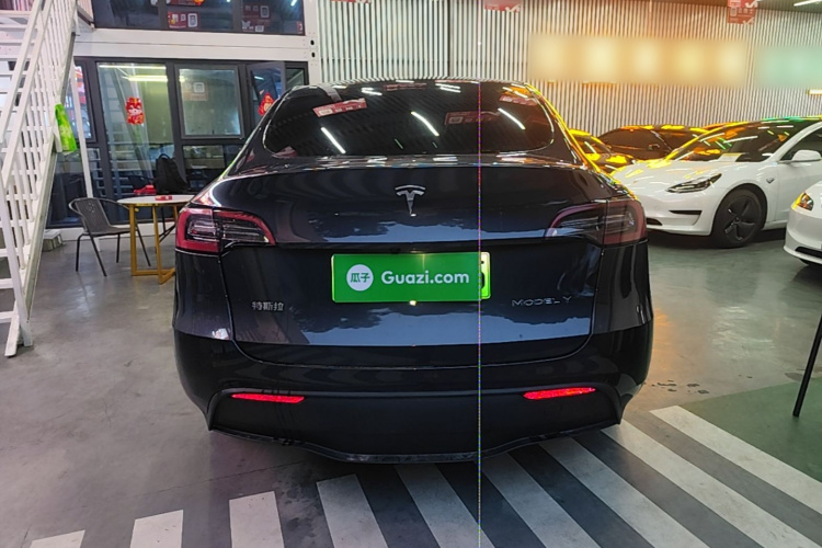 Tesla Model Y 2024 #4 Tesla Model Y 2024 car image #4