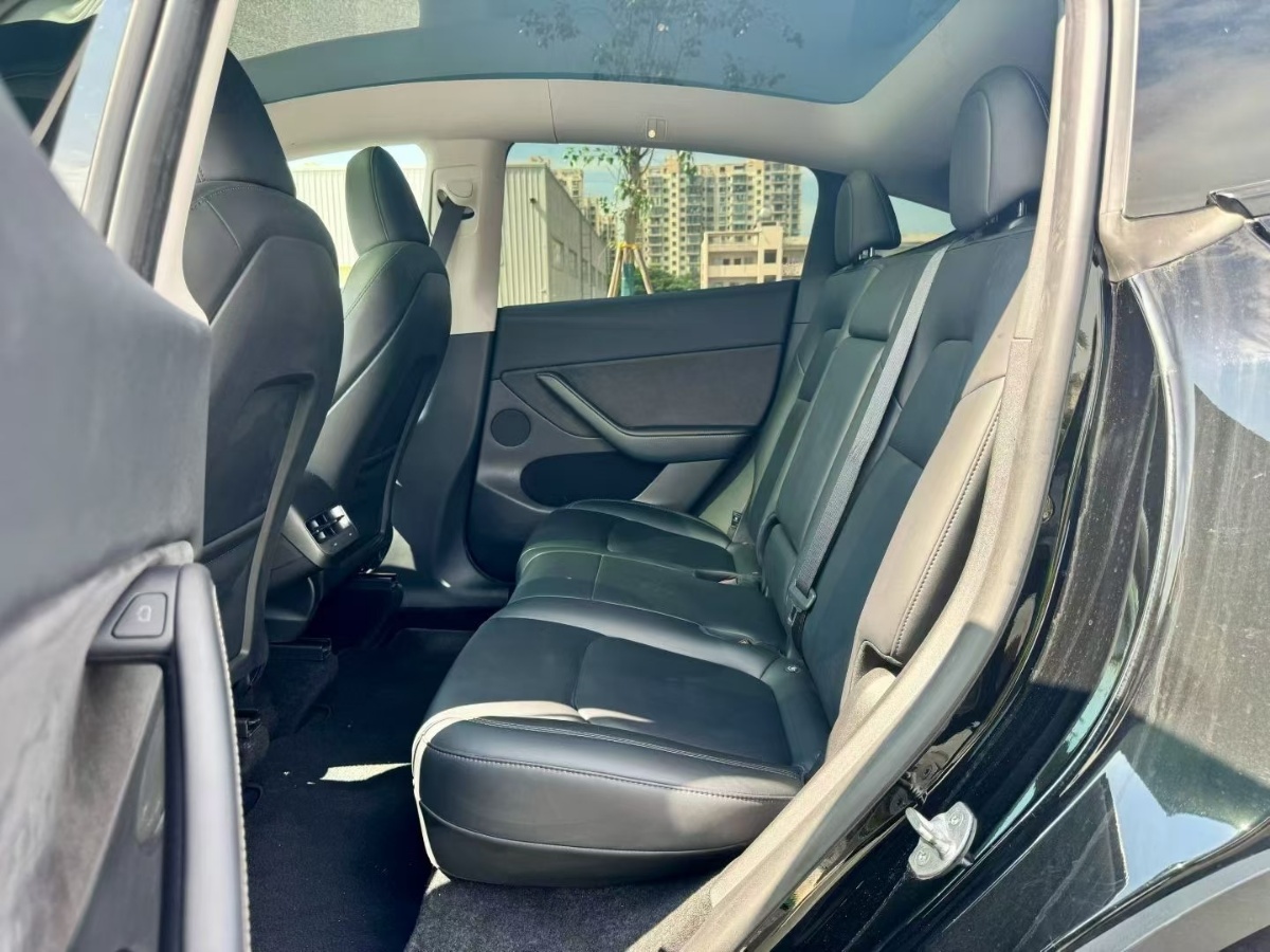 Tesla Model Y 2024 #6 Tesla Model Y 2024 car image #6