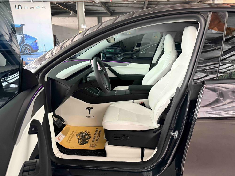 Tesla Model Y 2025 #8 Tesla Model Y 2025 car image #8