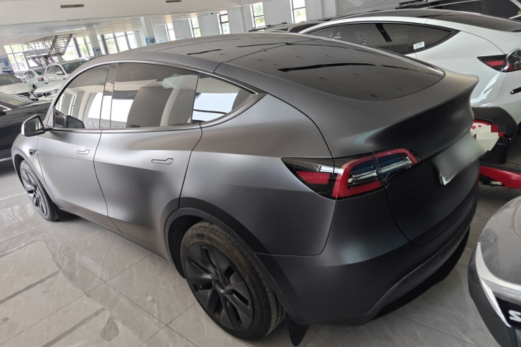 Tesla Model Y 2024 #5 Tesla Model Y 2024 car image #5
