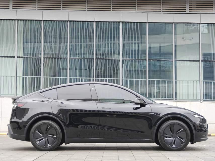 Tesla Model Y 2026 #6 Tesla Model Y 2026 car image #6