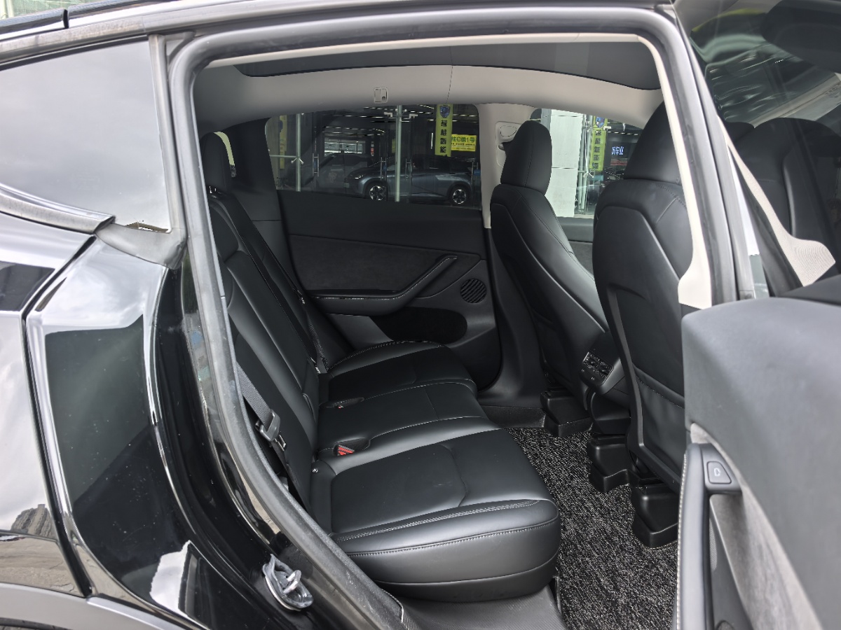 Tesla Model Y 2024 #7 Tesla Model Y 2024 car image #7