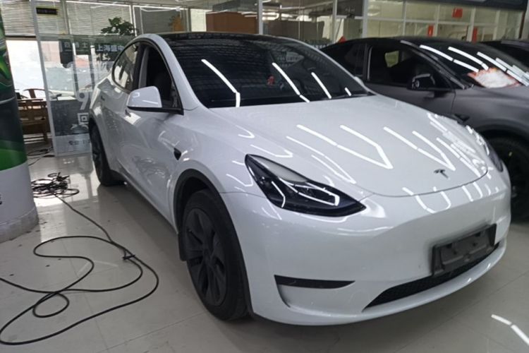 Tesla Model Y 2024 #4 Tesla Model Y 2024 car image #4
