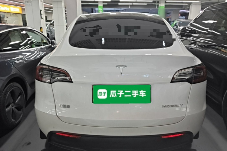 Tesla Model Y 2023 #6 Tesla Model Y 2023 car image #6